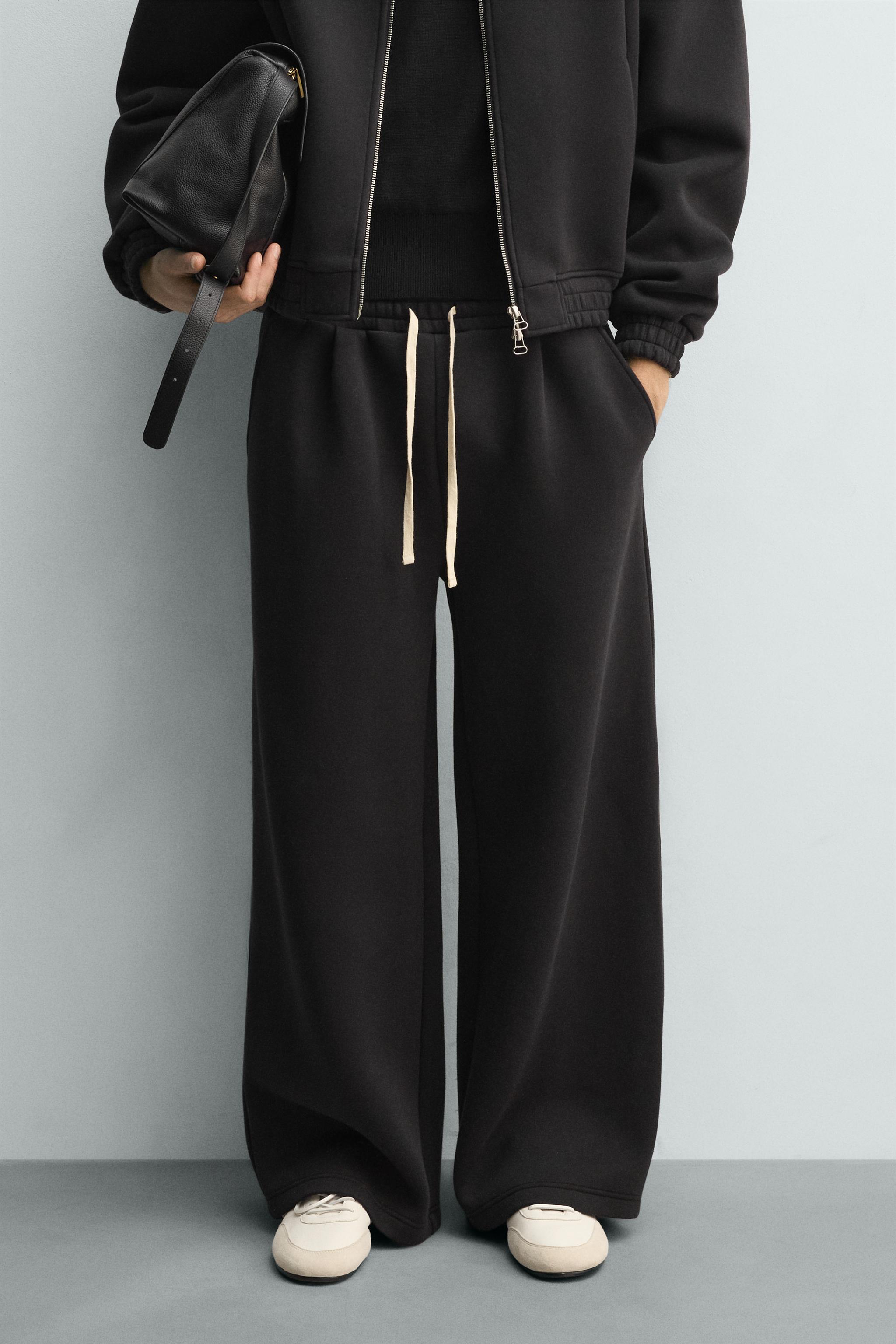 TECHNICAL PLEATED JOGGER PANTS
